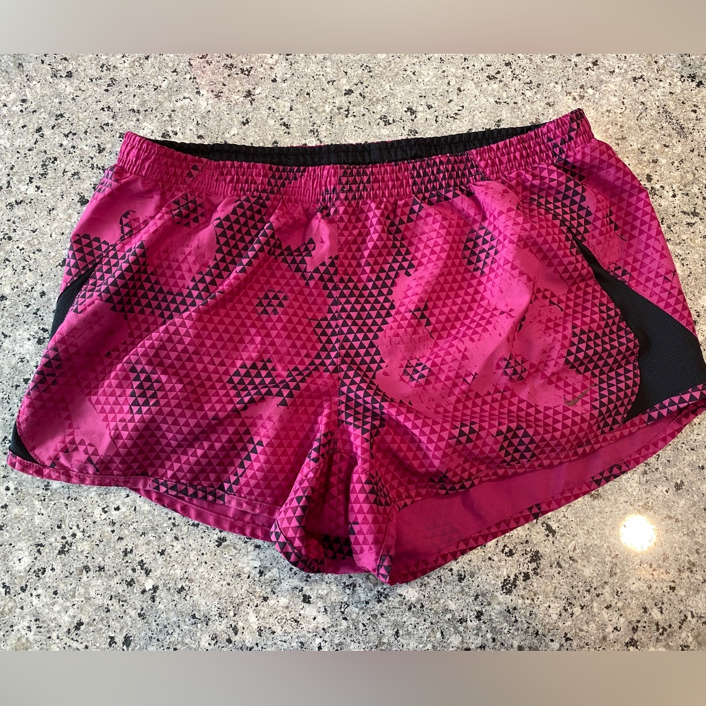 Pink Nike athletic shorts